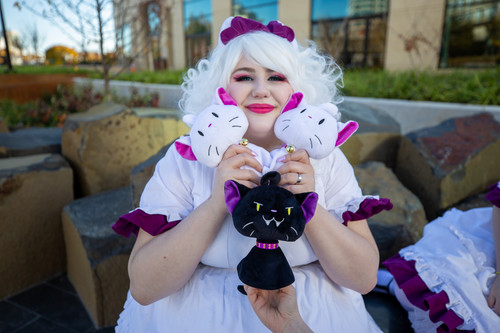 Cosplay Coven member with Ghost Neko plushies