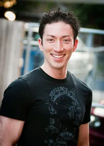 Portrait of Todd Haberkorn smiling.