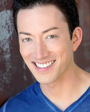 Portrait of Todd Haberkorn smiling.