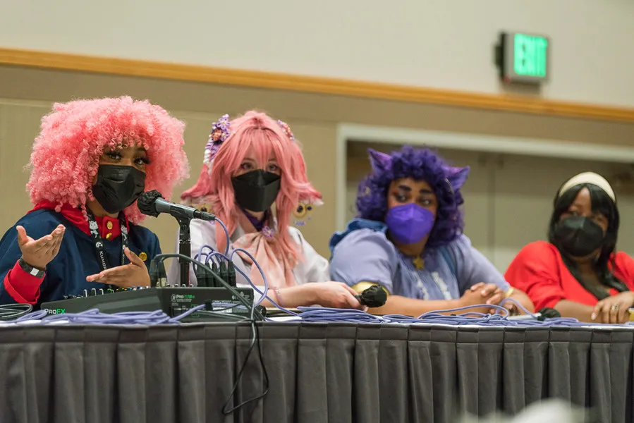 Guests sitting at a panel table